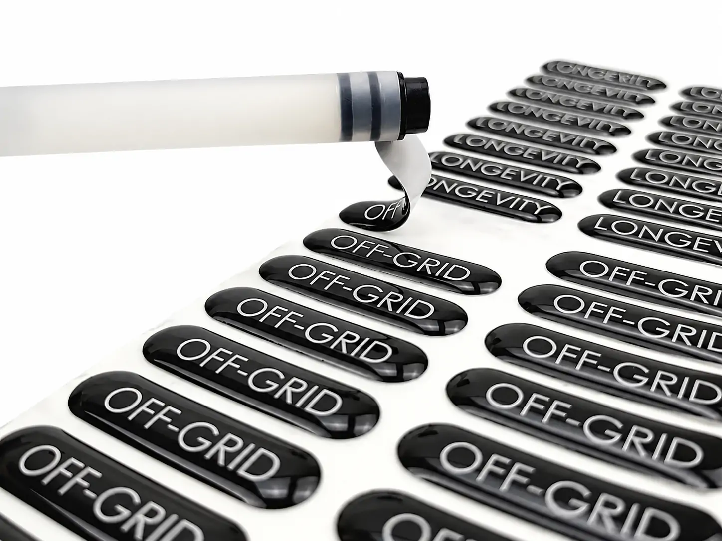 Clear doming resin used for raised 3D labels, domed stickers, badges and dimensional logo applications